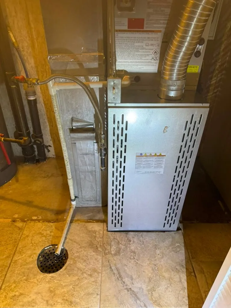 Completed furnace replacement by Lucas Heating and Air: new furnace set, vented, and wired in a clean mechanical room