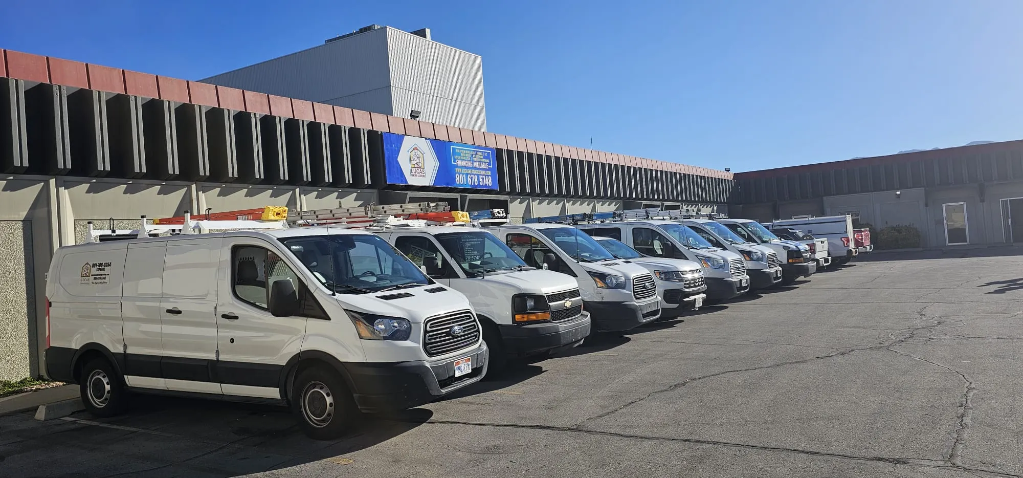 Lucas Heating and Air service van fleet ready for scheduled maintenance visits