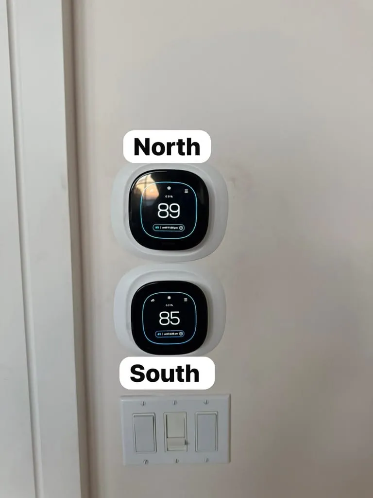 Two smart thermostats controlling separate north and south zones, installed by Lucas Heating and Air in a Riverton home